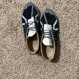 On Running Black and White Athletic Shoes Sleek Design